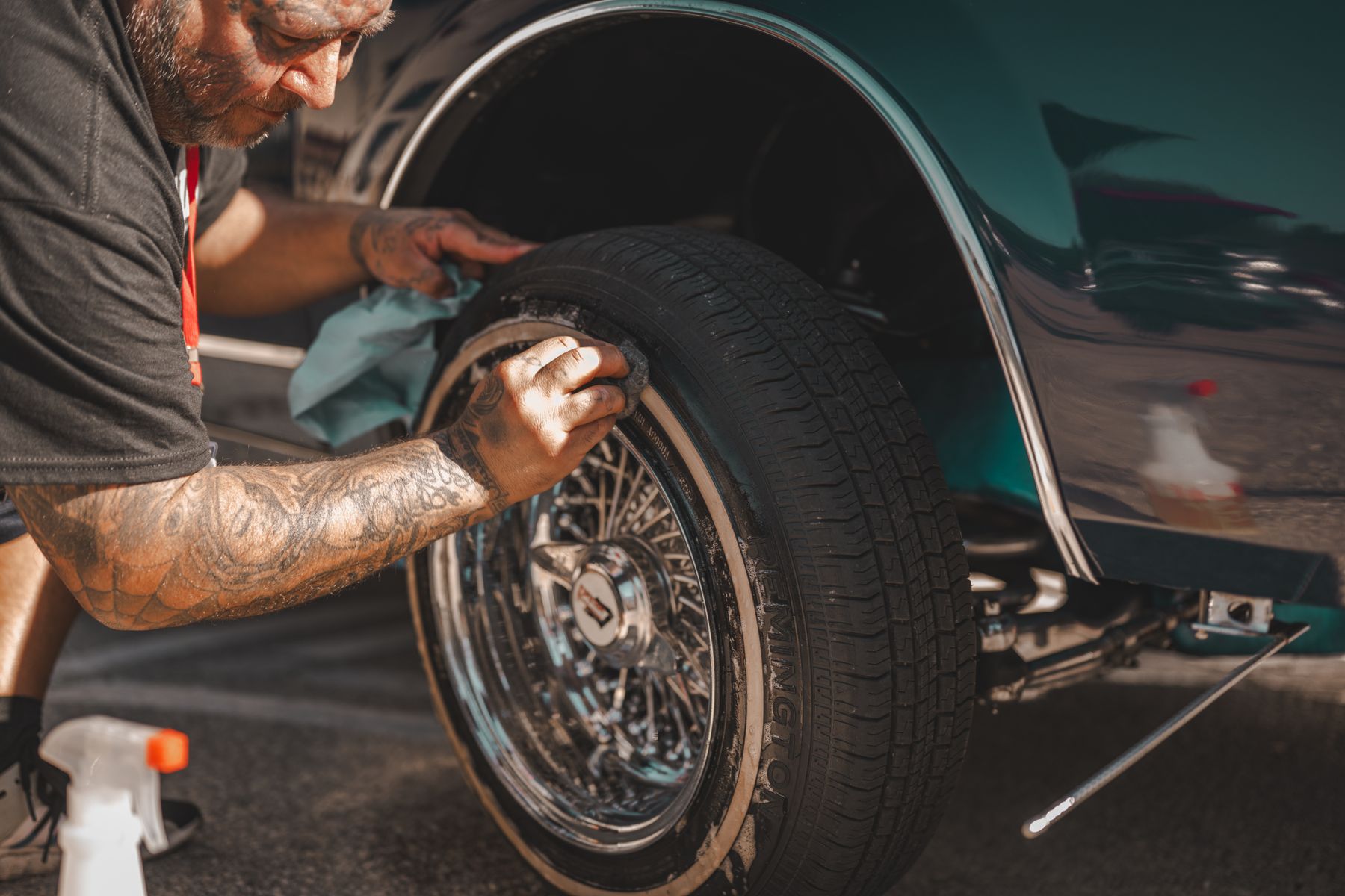A vehicle wheel covered with cleaning foam